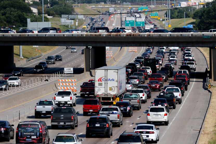  Traffic slowly moves along Interstate 635 near Abrams Road and all along the 11-mile...