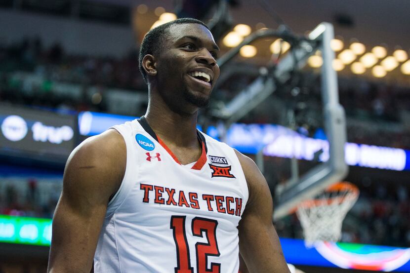 Texas Tech Red Raiders guard Keenan Evans (12) smiles after making a shot during the second...