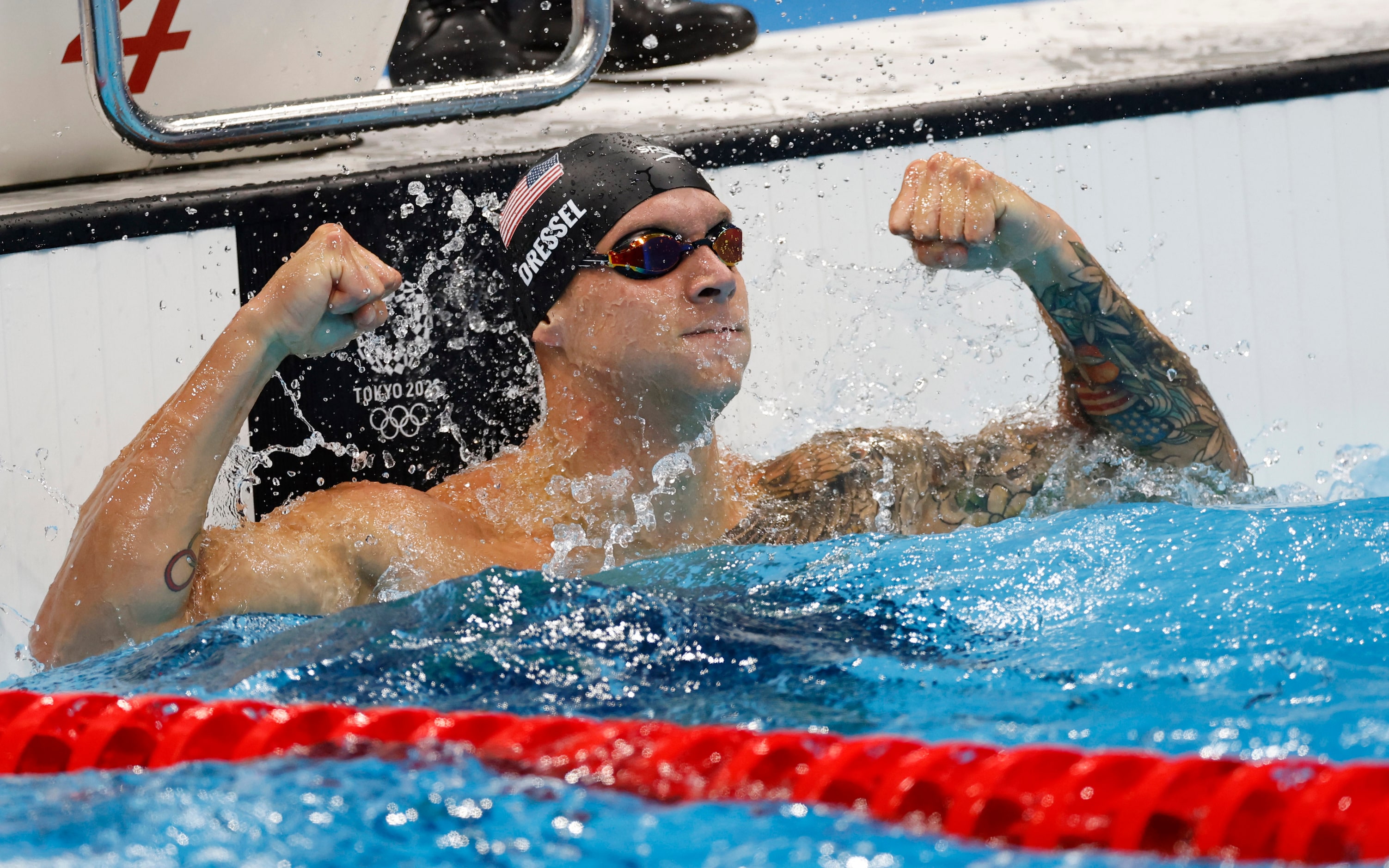 USA’s Caeleb Dressel celebrates after winning the men’s 50 meter freestyle final during the...