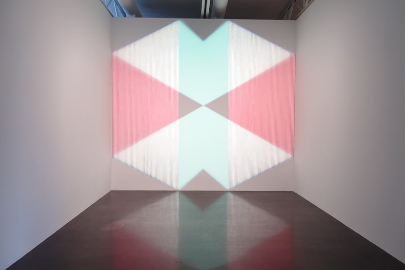 Dallas artist Jay Shinn's combination of wall painting and projected imagery allows his work...