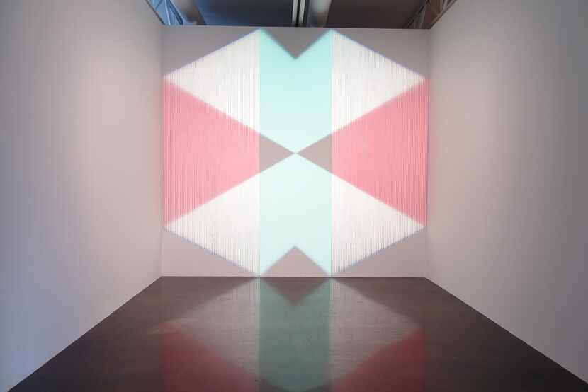 Dallas artist Jay Shinn's combination of wall painting and projected imagery allows his work...
