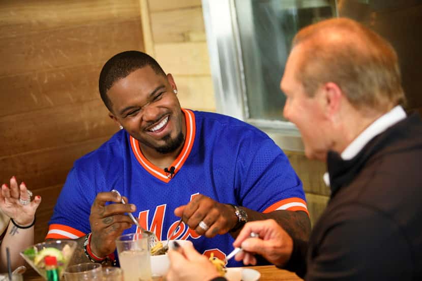 Prince Fielder laughs while eating a bowl of Uni Pasta during filming of his show "Fielder's...