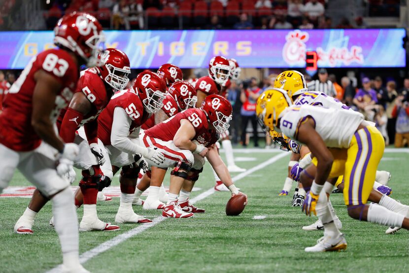 ATLANTA, GEORGIA - DECEMBER 28:  Creed Humphrey #56 of the Oklahoma Sooners prepares to snap...