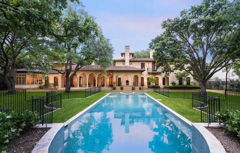 The pool at this house is part of a large outdoor living area.