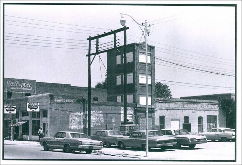 The little skyscraper during a period when it was boarded up and abandoned.