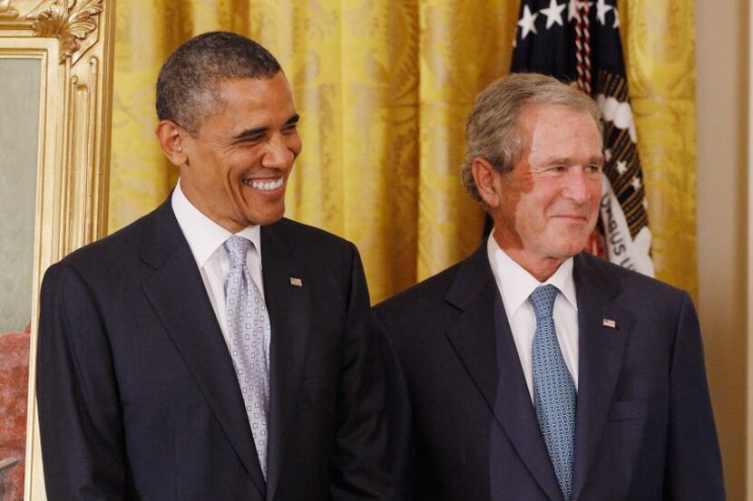 WASHINGTON, DC - MAY 31:  President Barack Obama (L) and former President George W. Bush...