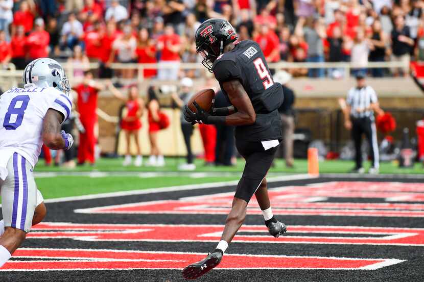 LUBBOCK, TX - NOVEMBER 4: T.J. Vasher #9 of the Texas Tech Red Raiders makes the catch for a...