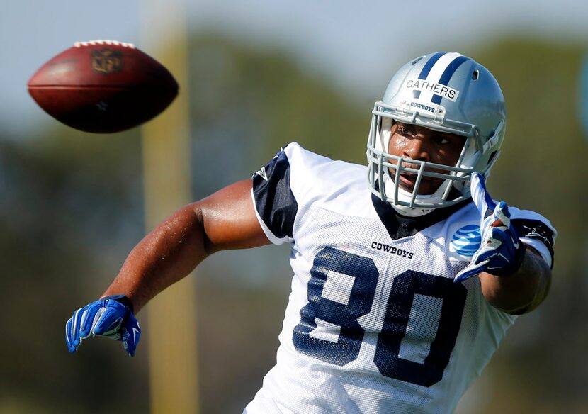 Dallas Cowboys tight end Rico Gathers (80) reaches for a pass during afternoon practice at...