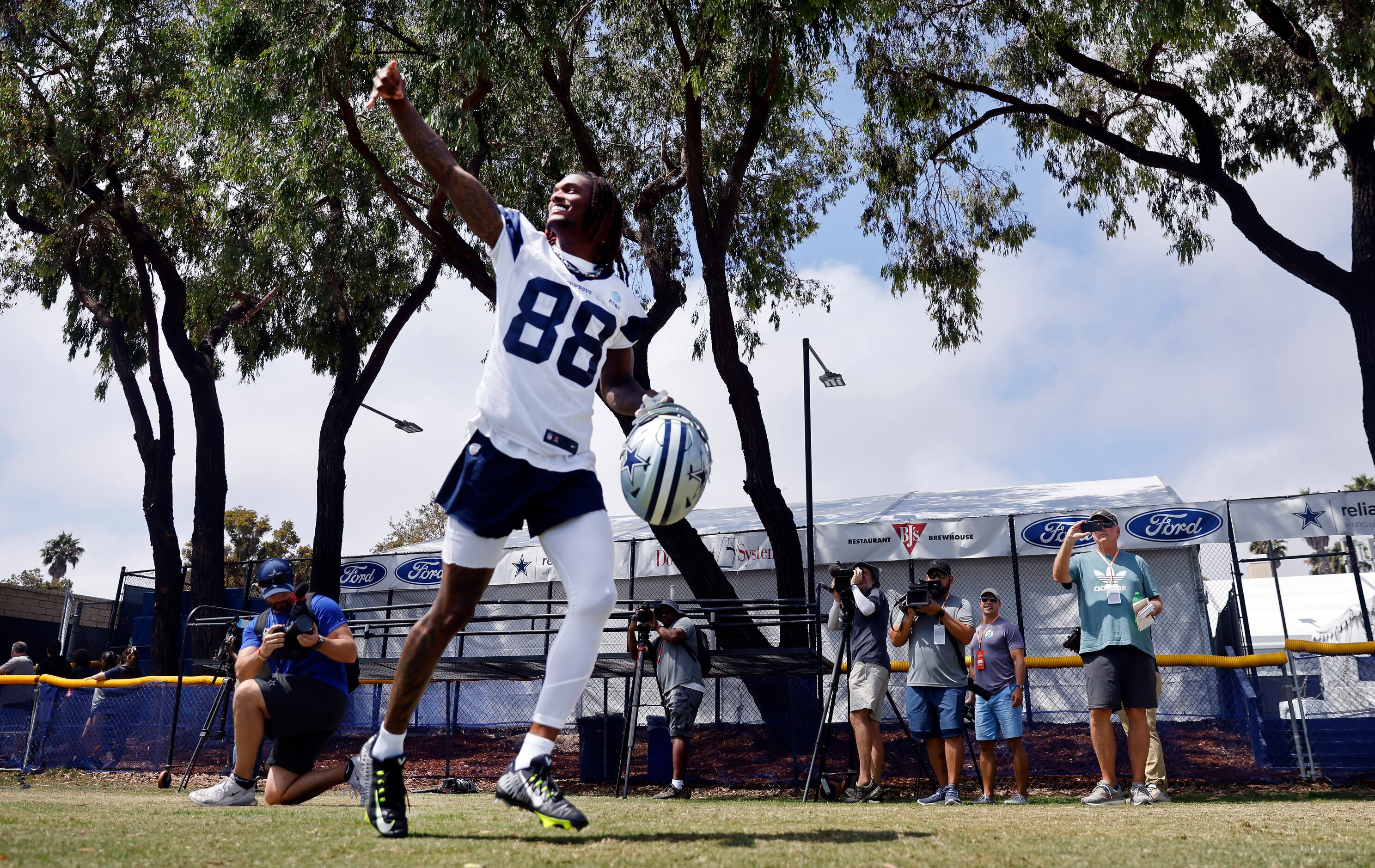 Wide receiver CeeDee Lamb of the Dallas Cowboys signs autographs