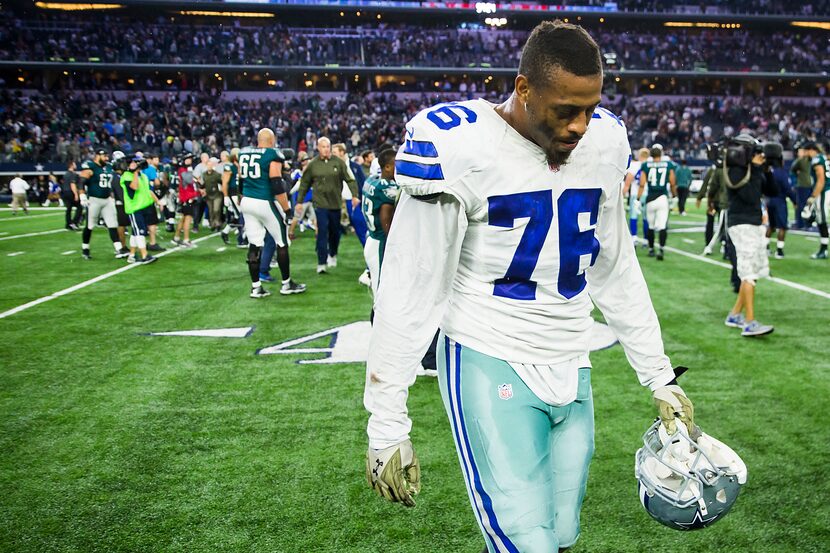 Dallas Cowboys defensive end Greg Hardy leaves the field following a 33-27 overtime loss to...