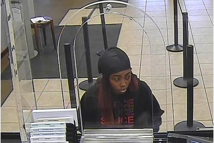 Arlington police released surveillance footage of a woman suspected of robbing several banks...