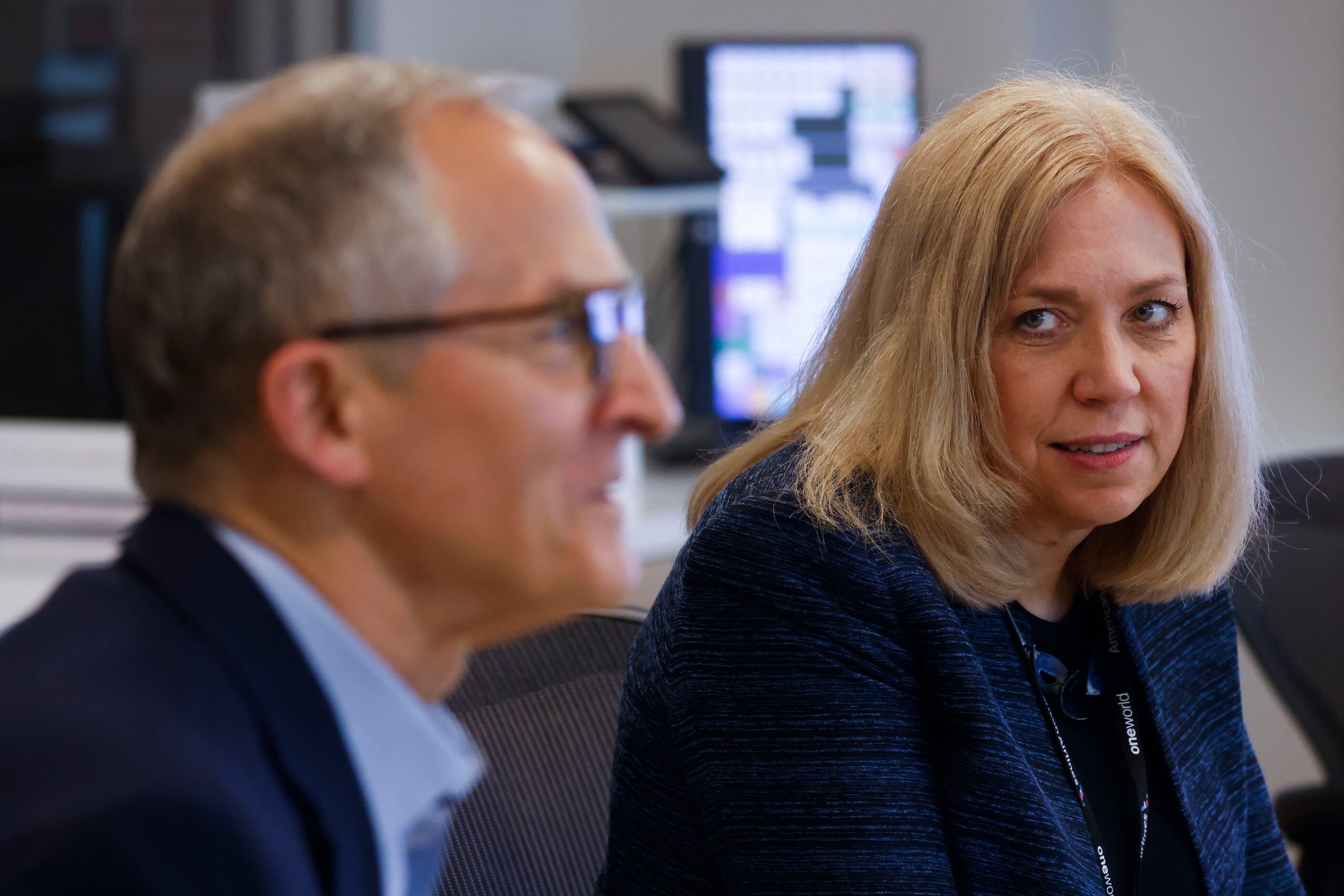 Julie Rath (right), senior vice president of airport operations of American Airlines listens...