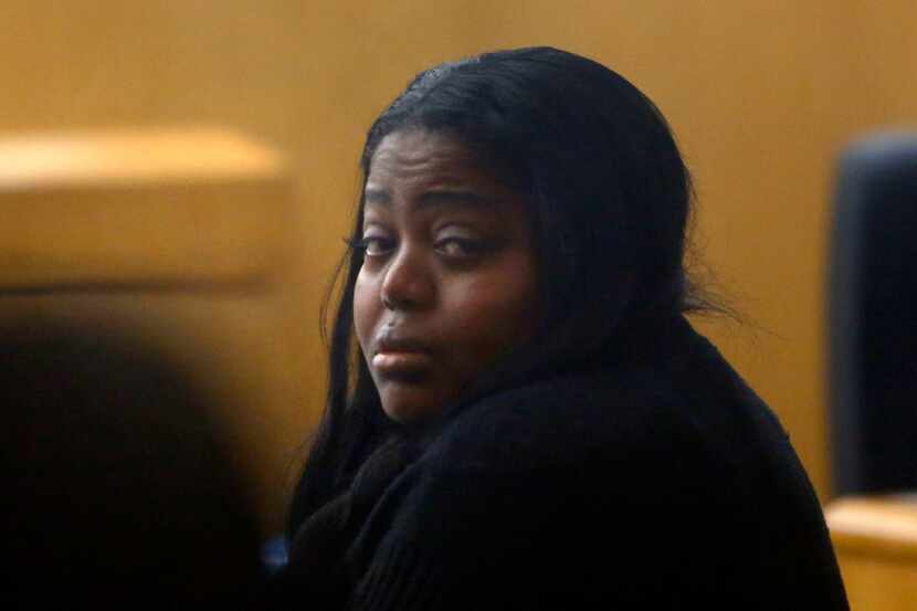 Denise Rochelle Ross sits with her attorney during a murder trial at Dallas County 204th...