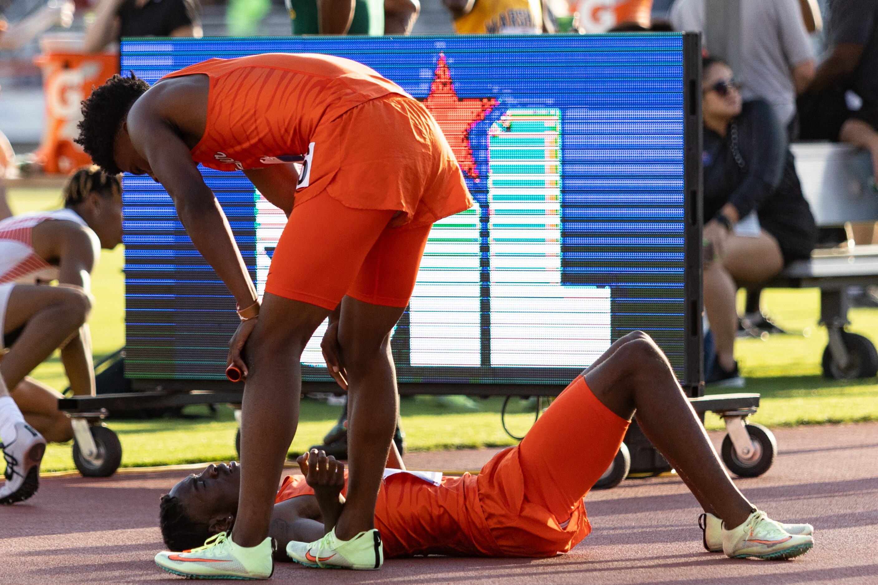 Lancaster’s Kordarion Smith rests after the boys’ 4x200 relay at the UIL Track & Field State...