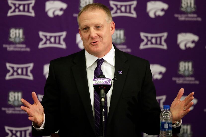 FILE - In this Dec. 12, 2018, file photo, new Kansas State NCAA college football head coach...