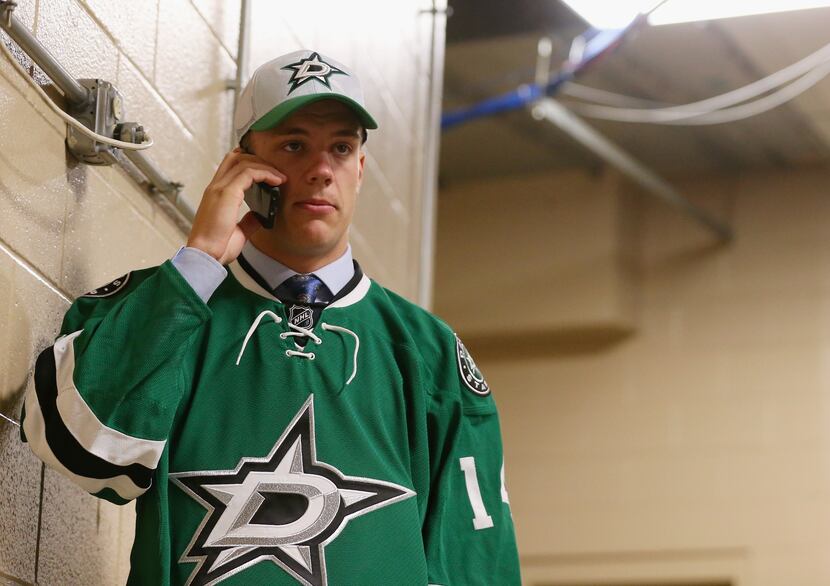 PHILADELPHIA, PA - JUNE 28:  Alexander Peters speaks on the phone after being drafted #75 by...