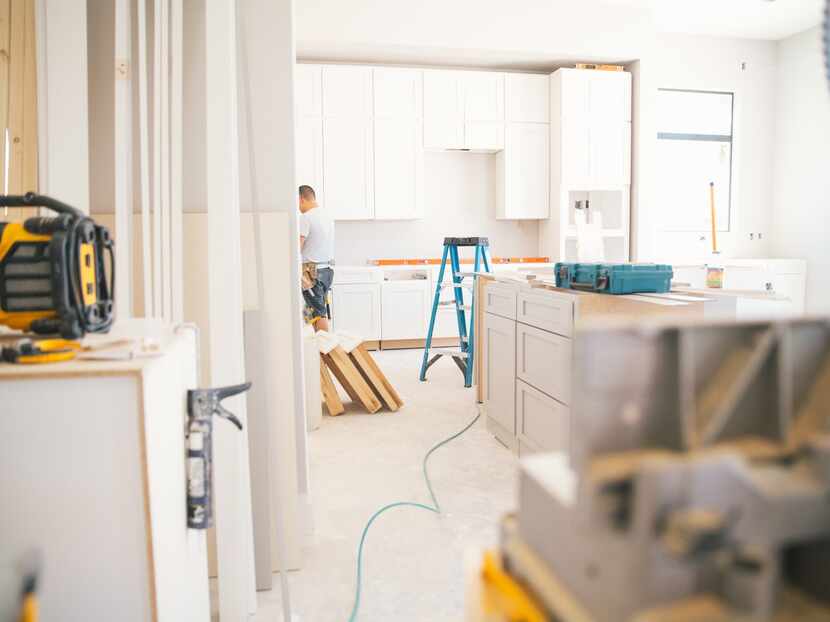 Man remodeling a kitchen