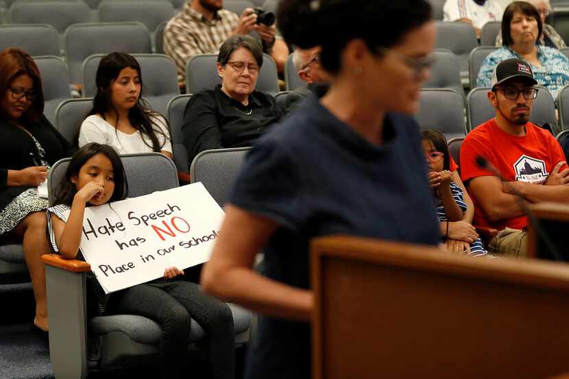 Community members spoke out against the actions of Carter-Riverside High School teacher...