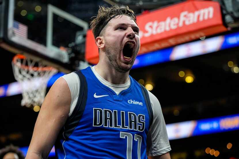 Dallas Mavericks guard Luka Doncic (77) celebrates his shot against the Atlanta Hawks during...