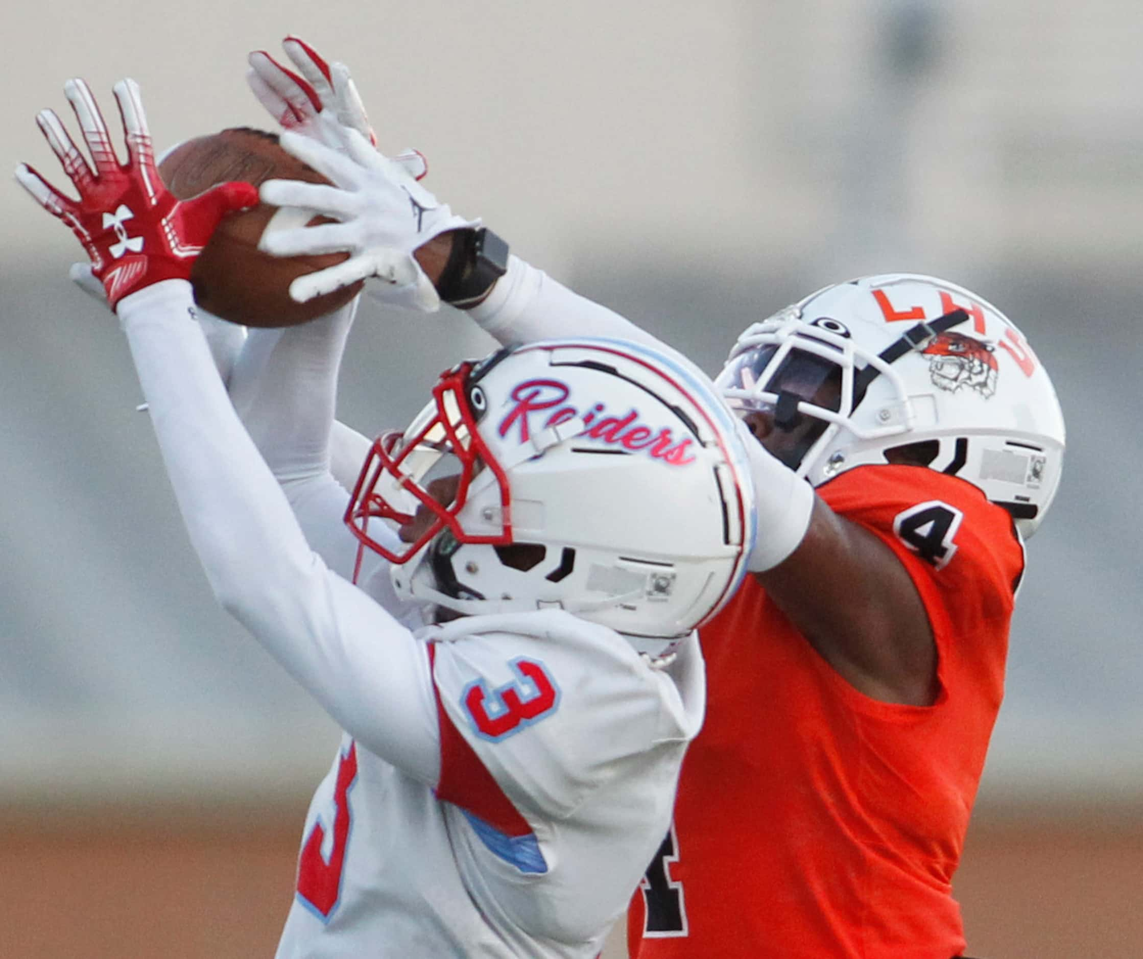 Dallas Skyline defensive back Devantae Oliver (3) intercepts a pass intended for Lancaster...