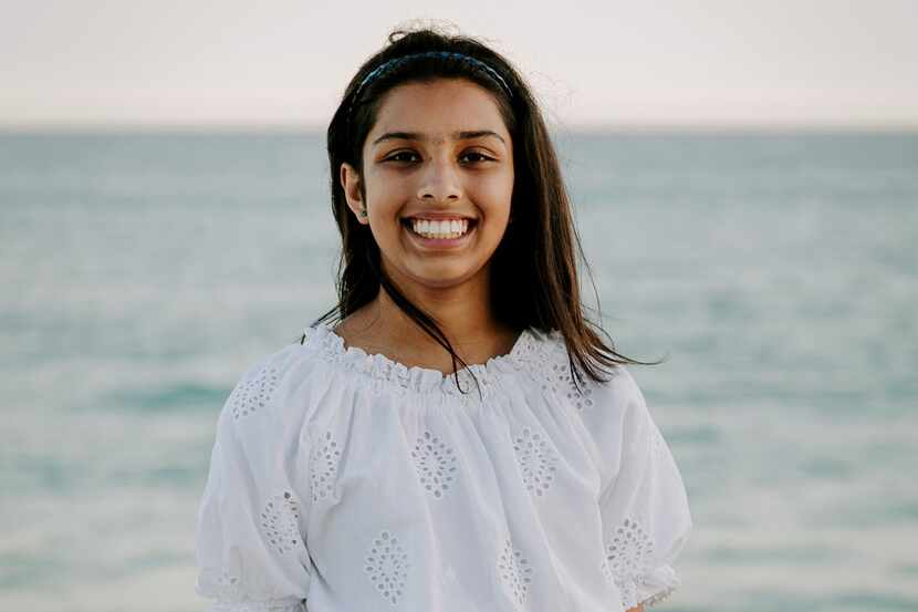Sia Sankaran, 10, on the beach at family vacation in 2021. Sankaran is creating "grief kits"...