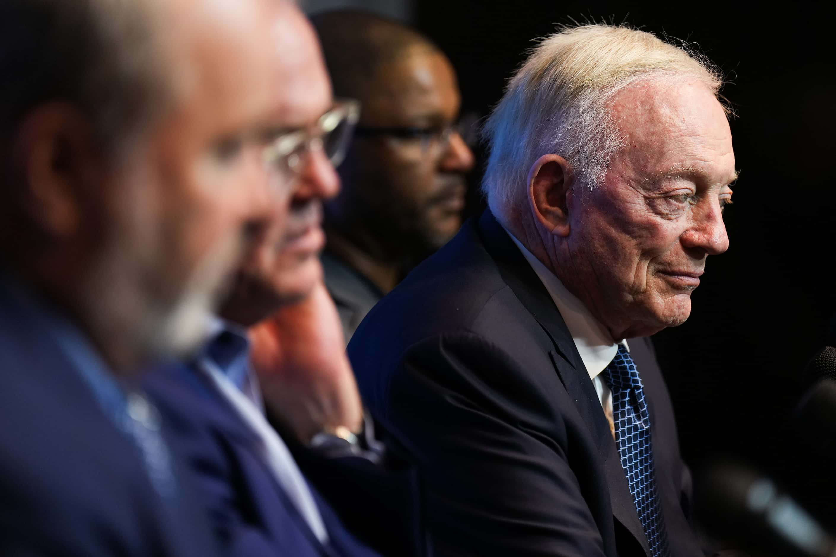 Dallas Cowboys owner and general manager Jerry Jones listens to a question from reporters...