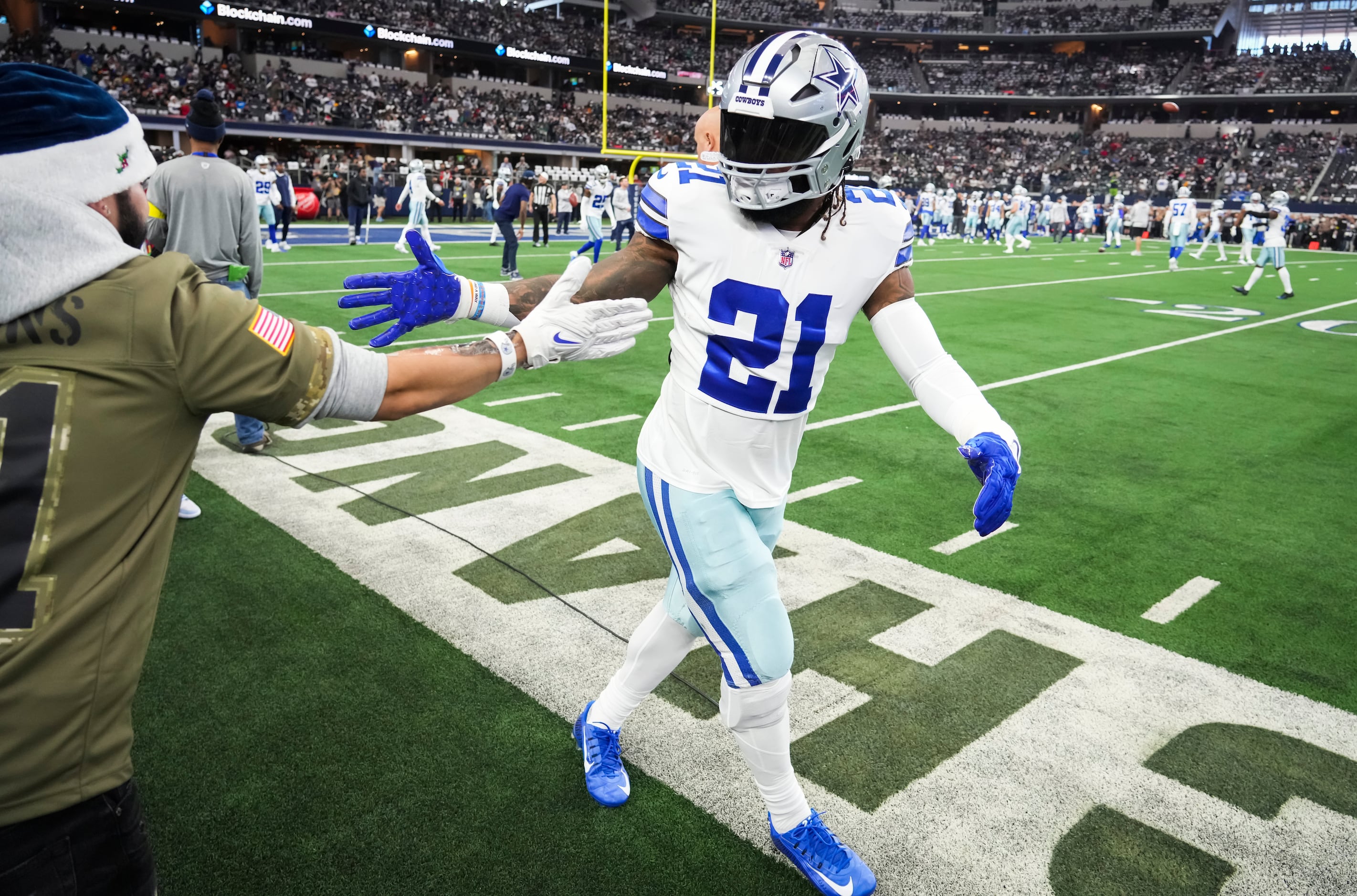 Arlington, United States. 24th Dec, 2022. Dallas Cowboys Dak Prescott gets  stopped by Philadelphia Eagles Brandon Graham, left, and Ndamukong Suh  during their NFL game at AT&T Stadium in Arlington, Texas on