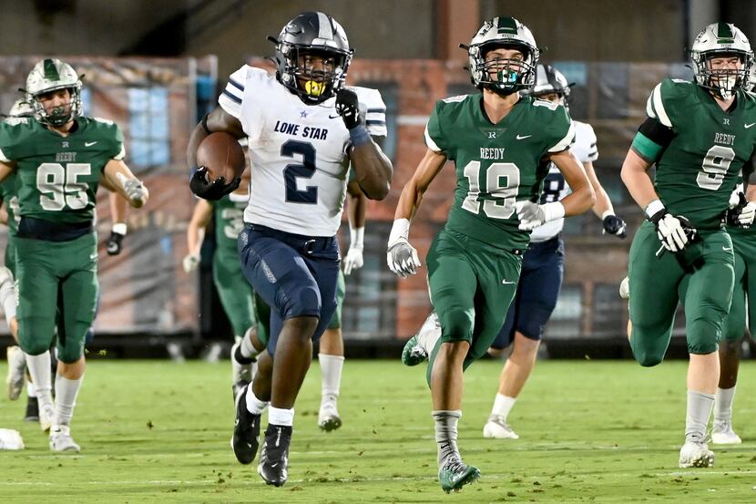 Frisco Lone Star’s Ashton Jeanty (2) runs for a long touchdown in the first half of a high...
