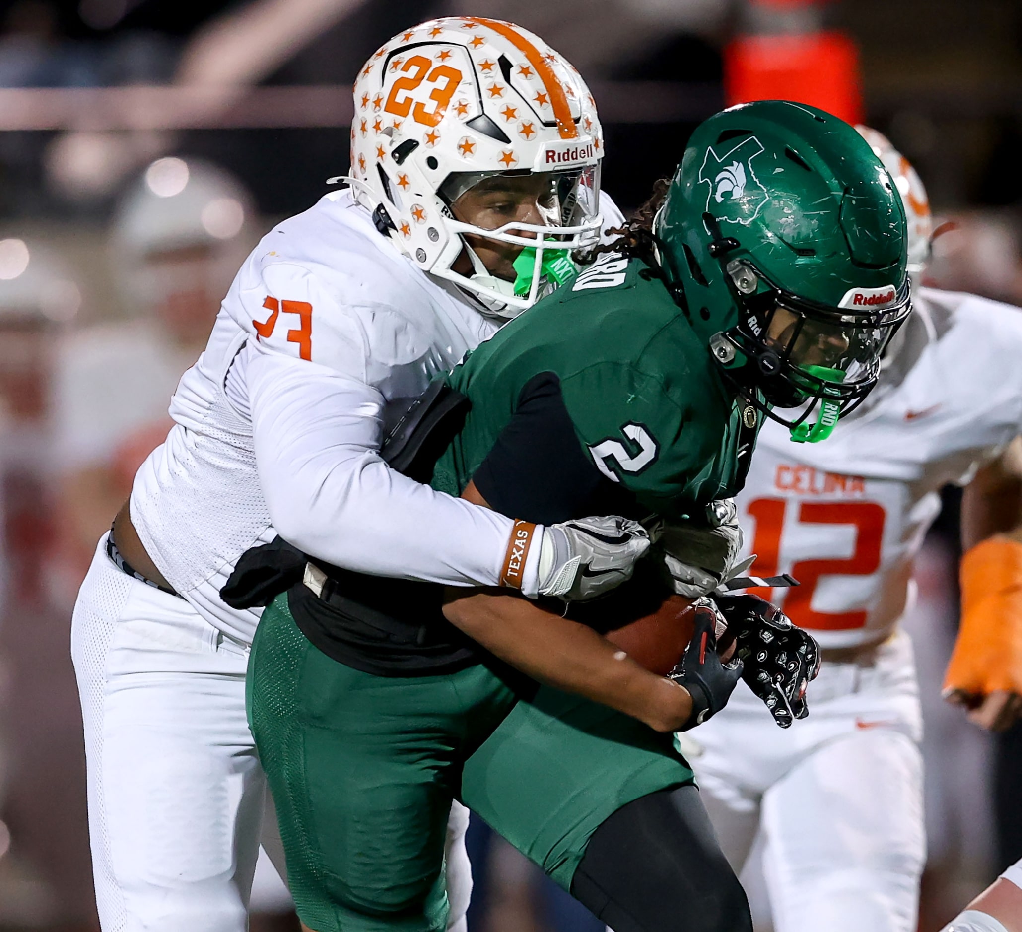 Celina defensive tackle Cameron Lucas (23) stuffs the run on Kennedale running back Jordan...