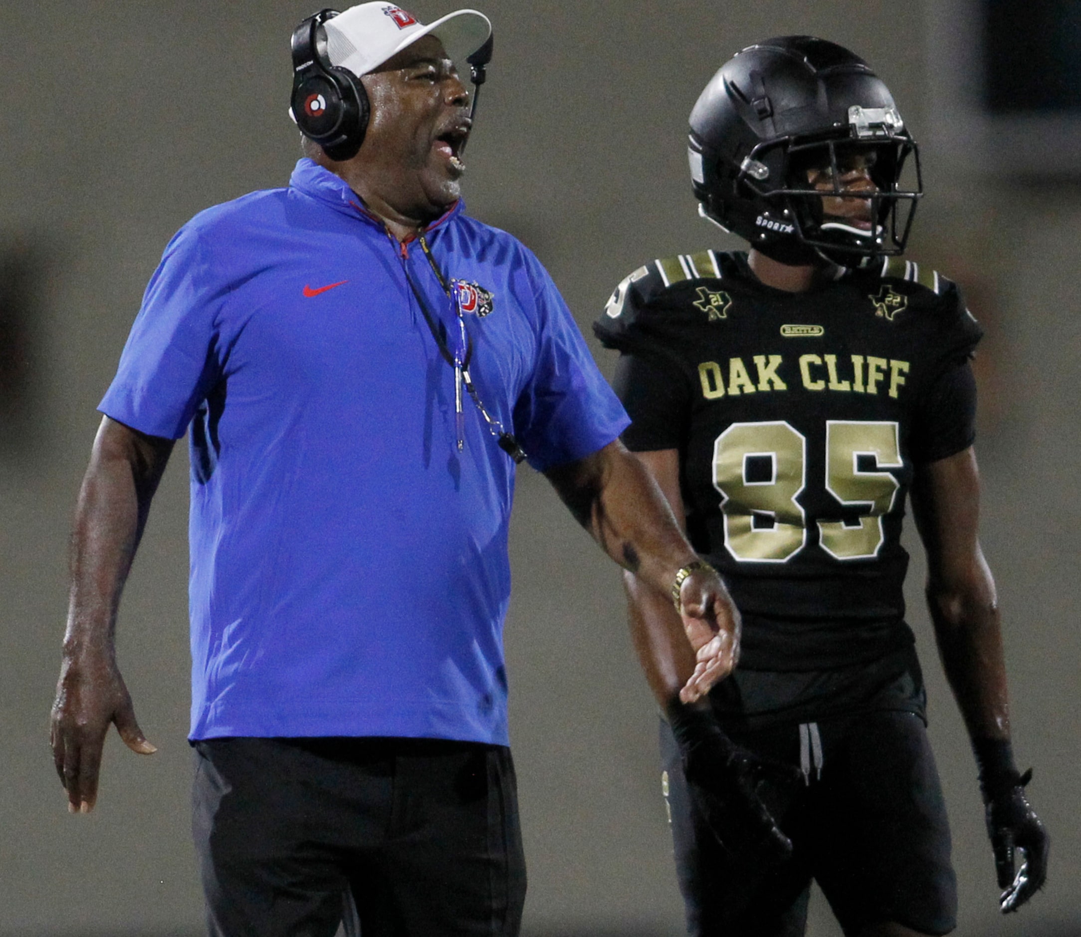 Duncanville head coach Reginald Samples shows his displeasure with one of his defensive...