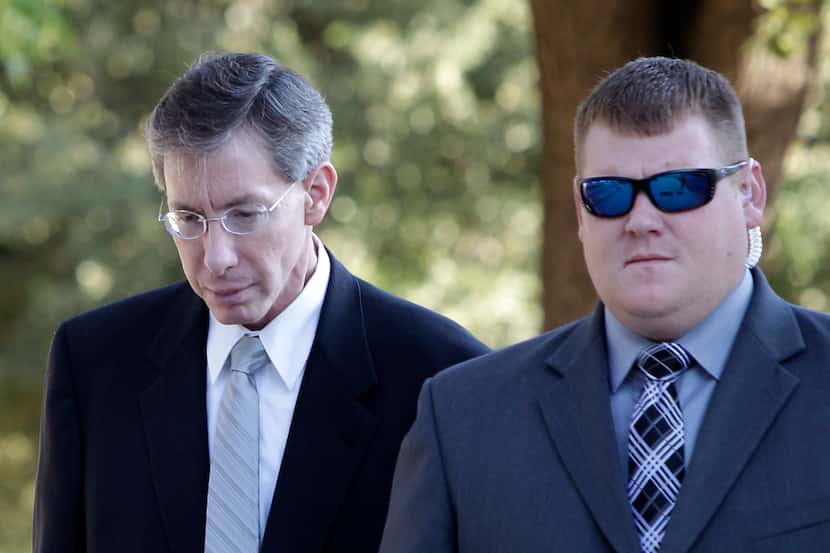 File - In this Aug. 3, 2011 file photo, Polygamist religious leader Warren Jeffs, left,...