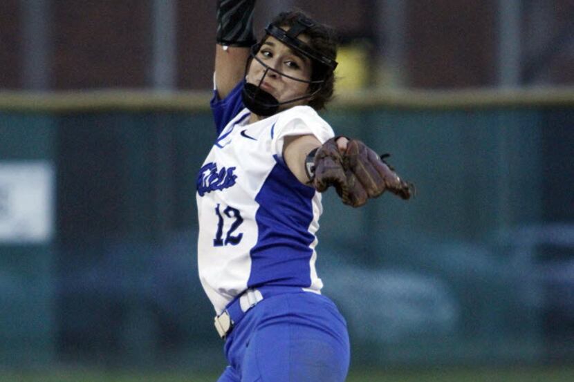 Plano West junior pitcher Sierra Lange (12) pitches during a District 6-6A game with Plano...
