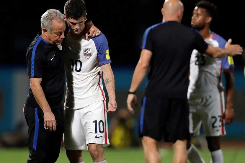 FILE - In this Oct. 10, 2017, file photo, United States' Christian Pulisic, (10) is...