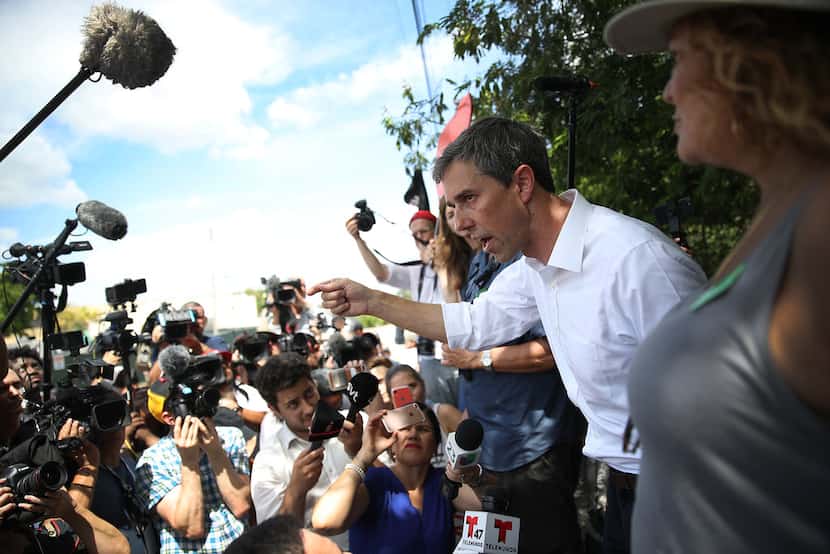 Democratic presidential candidate Beto ORourke speaks to the media as he visits the outside...