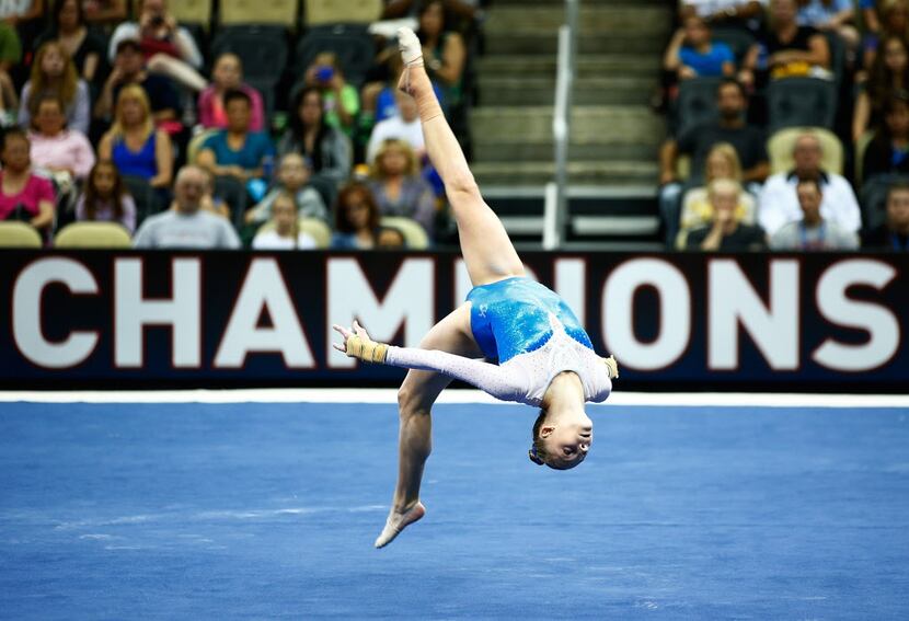  Alyssa Baumann competes in the floor exercise of the senior women preliminaries during the...