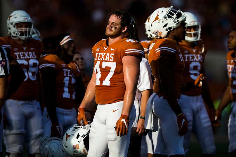 Texas Longhorns tight end Andrew Beck (47) reacts to a call overturning a touchdown during...