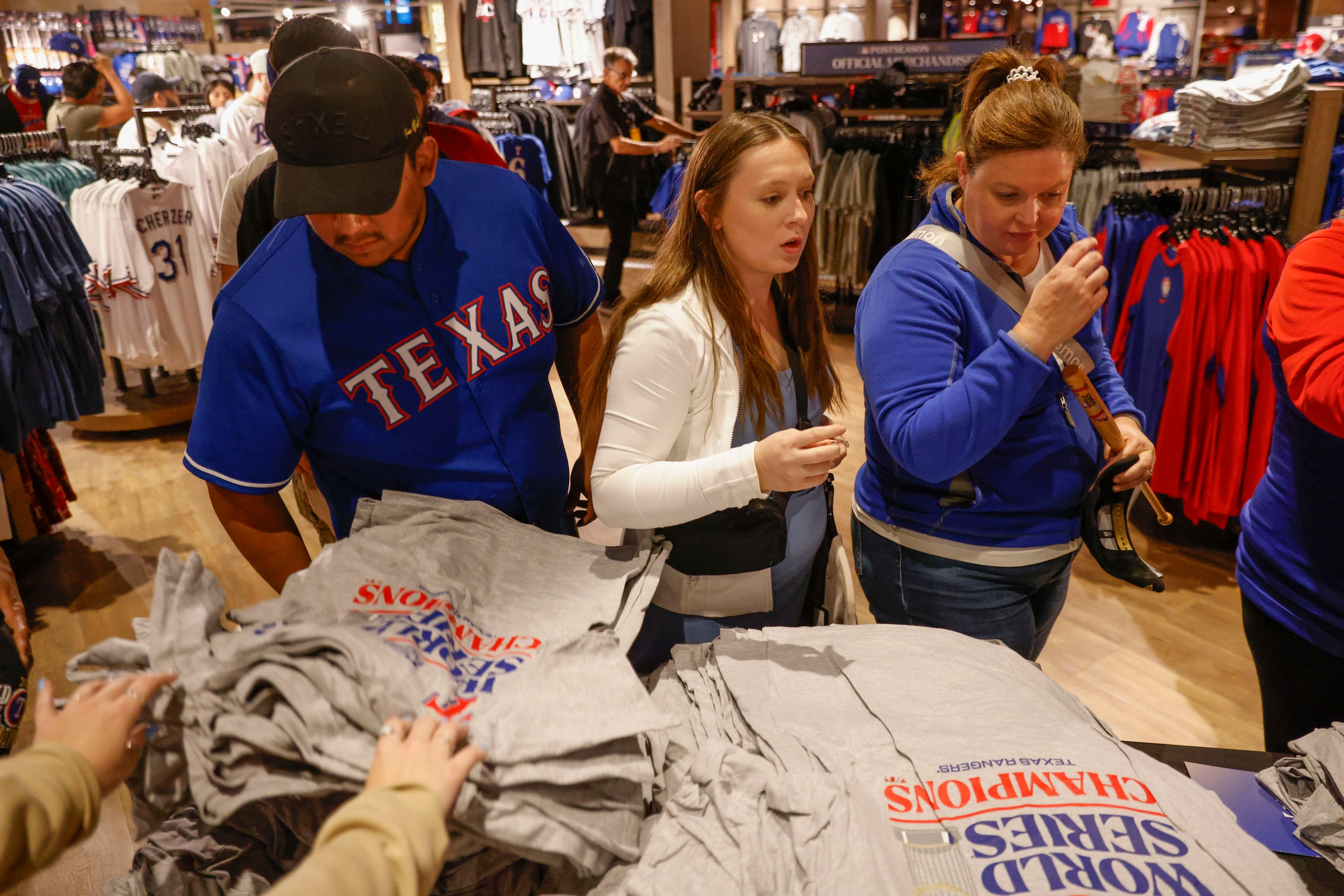 Texas Rangers fans go through the Grand Slam store following Texas Rangers’ winning the...