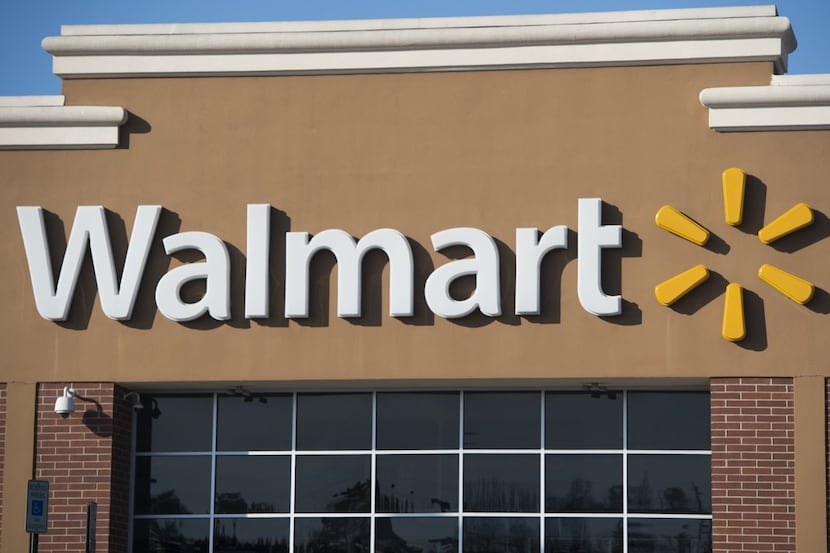 (FILES) This file photo taken on December 31, 2014 shows a Walmart store in Landover,...