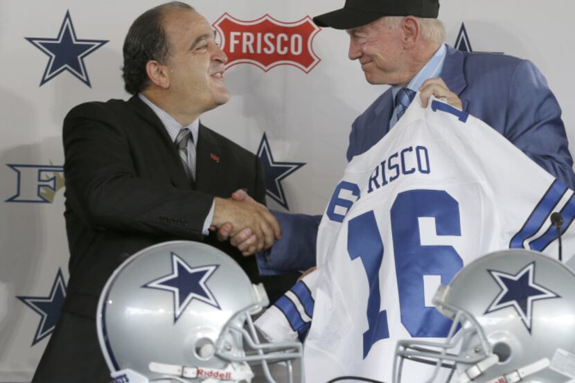 Dallas Cowboys owner Jerry Jones (right) shakes hands with Frisco mayor Maher Maso after a...