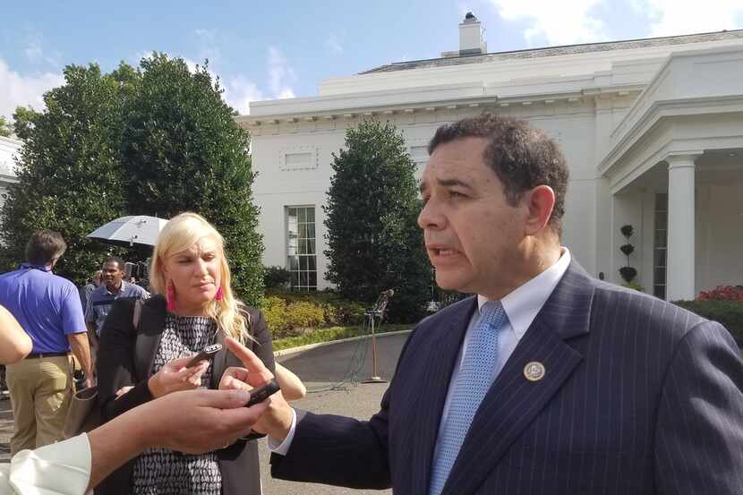 Rep. Henry Cuellar, D-Laredo, speaks with reporters at the White House after a meeting with...