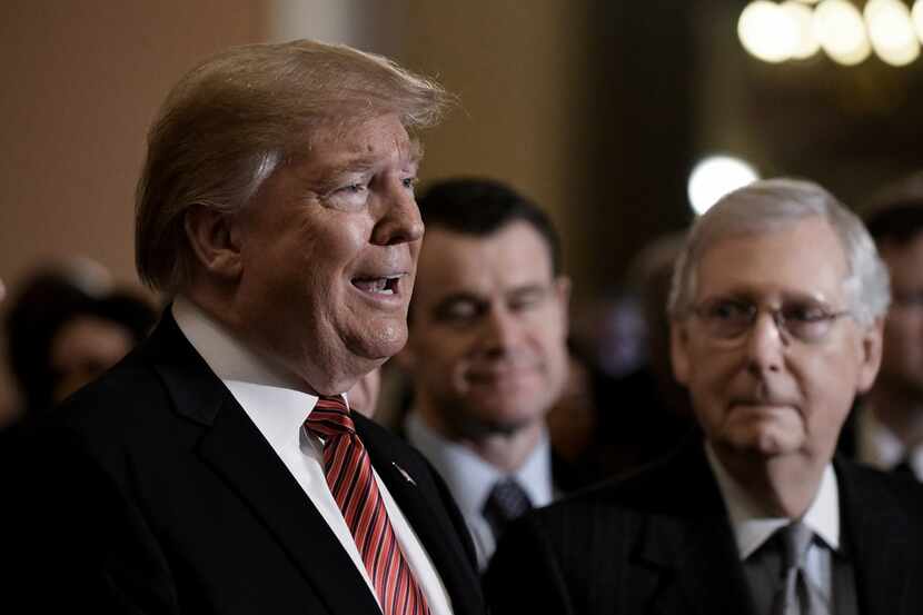 President Donald Trump talks to the press with Senate Majority Leader Mitch McConnell,...