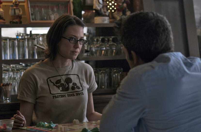 In this image released by 20th Century Fox, Carrie Coon, left, and Ben Affleck appear in a...