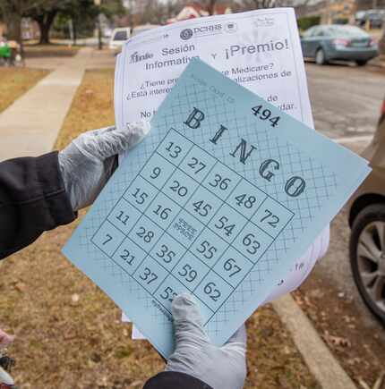 Bingo cards are included in meal packs for a game that seniors play in a conference call.
