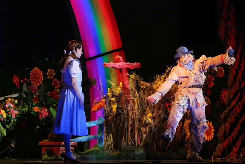 Dorothy (Danielle Wade, left) and Scarecrow (Jamie McKnight, right) perform in opening night...