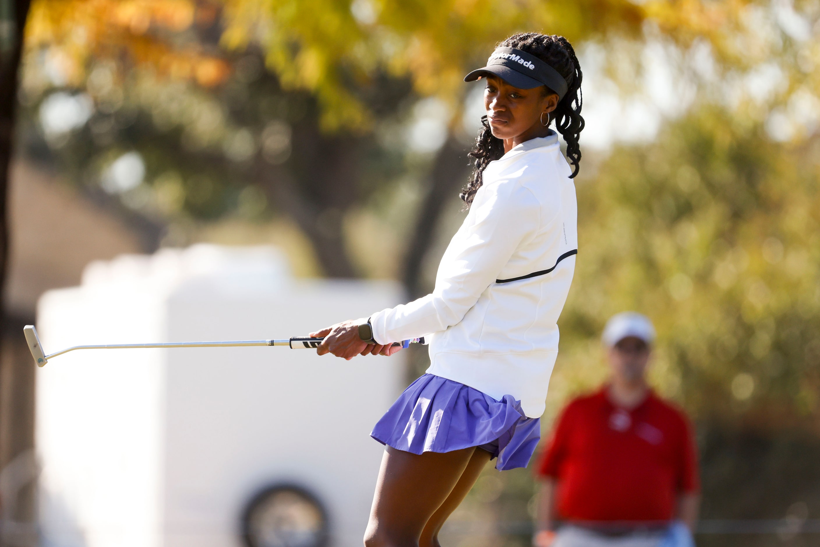 Kennedi Lee of North Carolina A&T, reacts to missing a putt on the seventh hole during the...