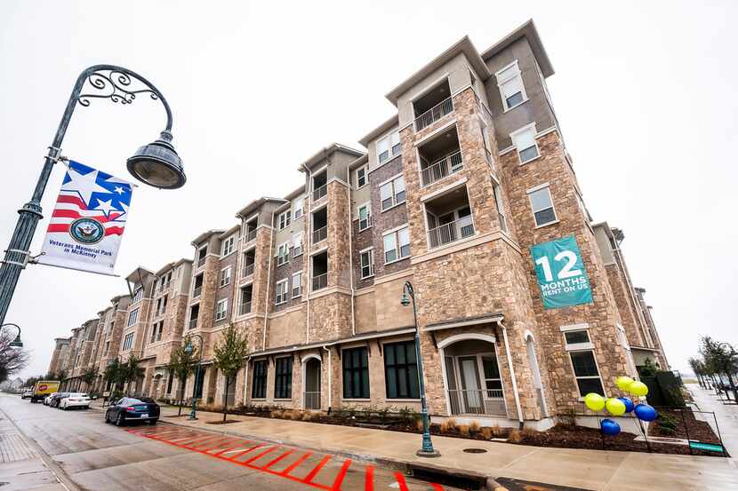 Signs advertise the rent promotion at Central Park at Craig Ranch luxury apartment community.