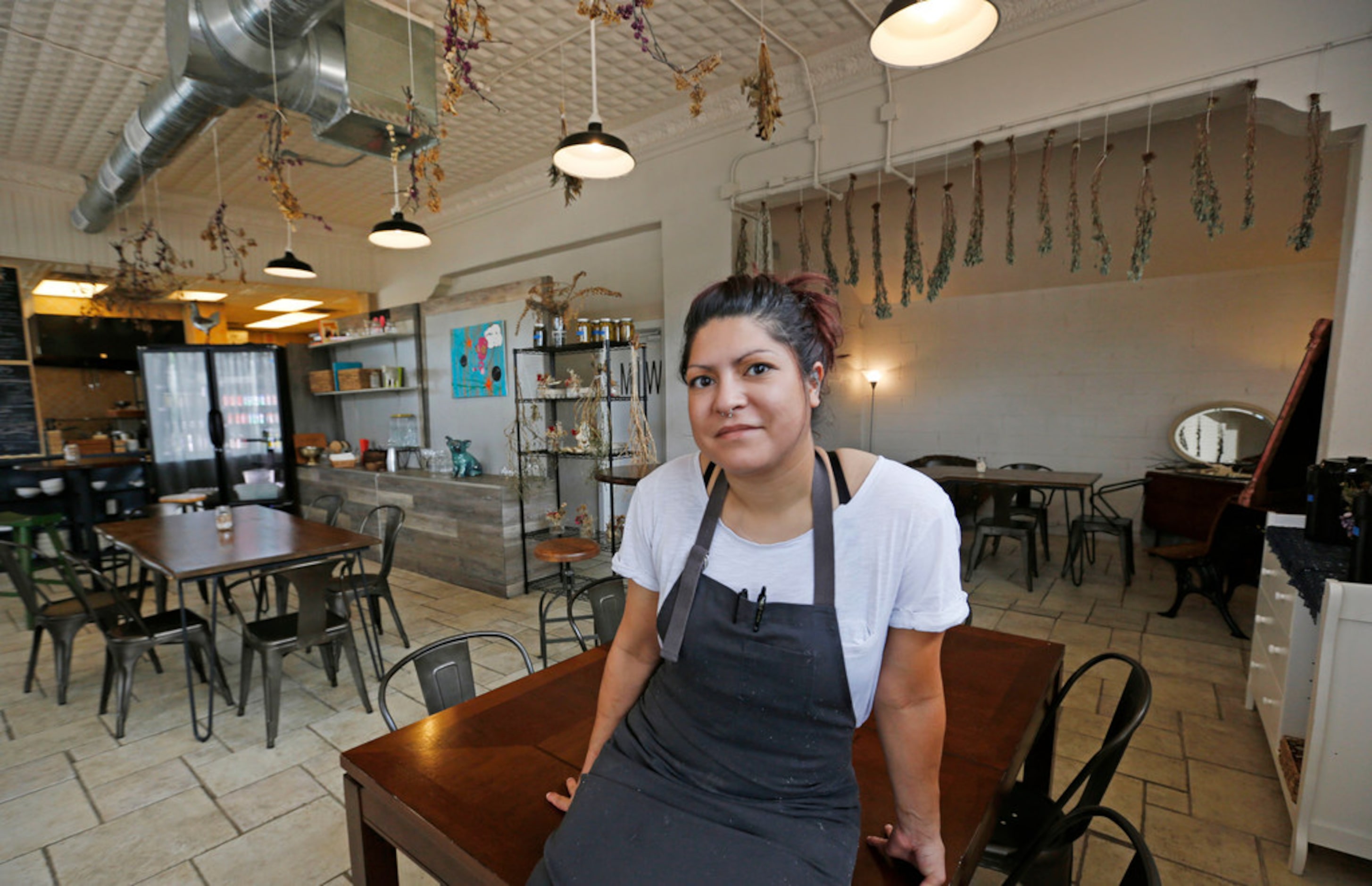 Here's one of our oldest Petra and the Beast photos, of chef Misti Norris in the dining room...