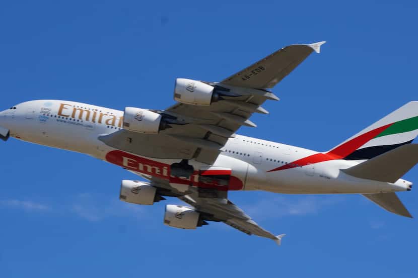  An Airbus A380 flown by Emirates Airline approaches Dallas/Fort Worth International Airport...