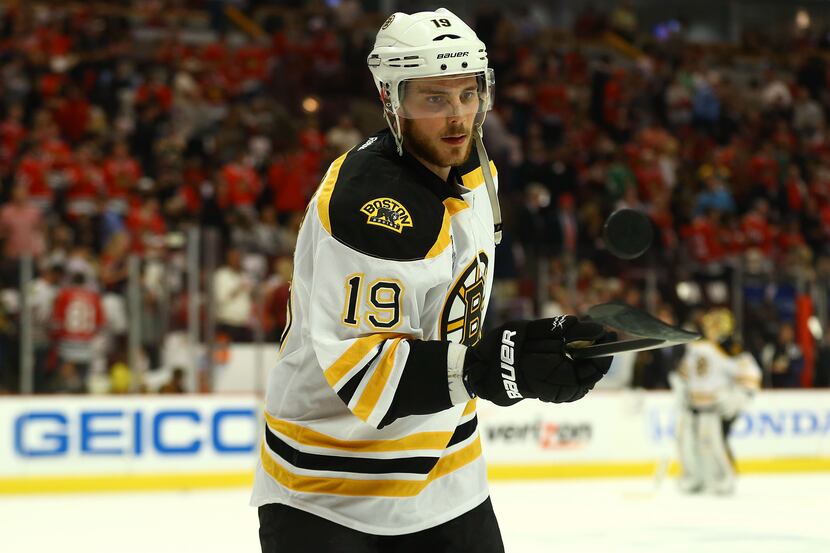 Tyler Seguin #19 of the Boston Bruins bounces a puck on his stick during warm ups against...