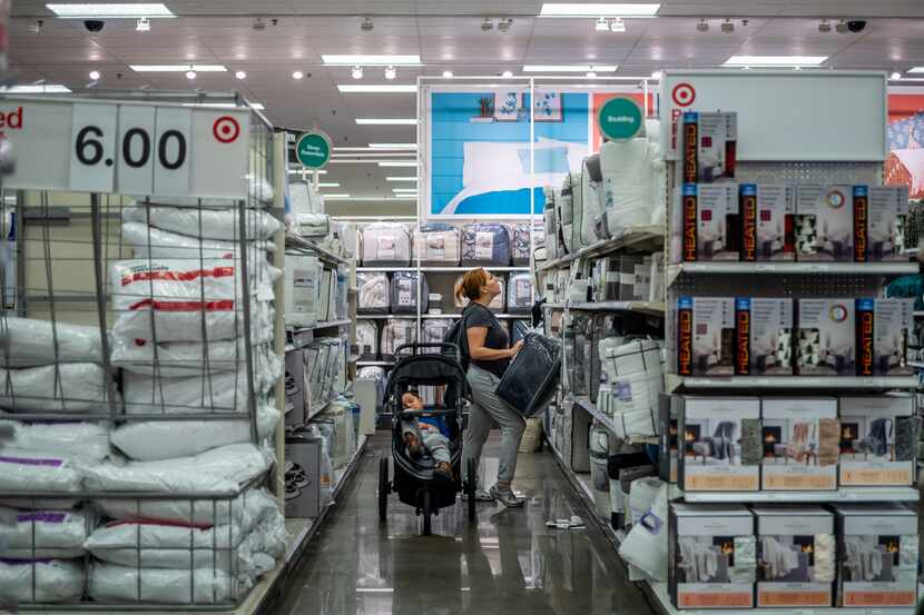 A customer shops for linen at a Target store in Houston in December. Target shares are on...